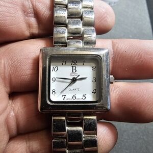 Blacker Ladies Quartz Fashion Watch Silver Tone White Dial Squared Case Working
